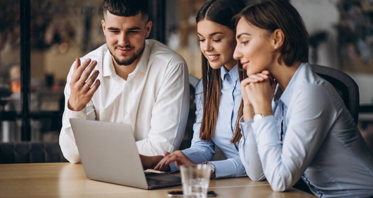 group-people-working-out-business-plan-office-min-1200x800